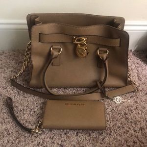 Micheal Kors medium sized Tan bag